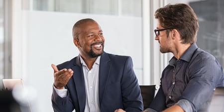 Lender talking to a real estate investor about cash-out refinance loans