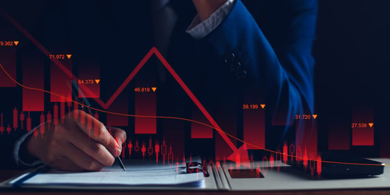 Investor analyzing his underperforming investments and feeling frustrated by banking regulation stress